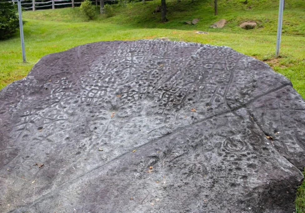 The Judaculla stone, with hundreds of petroglyphs.